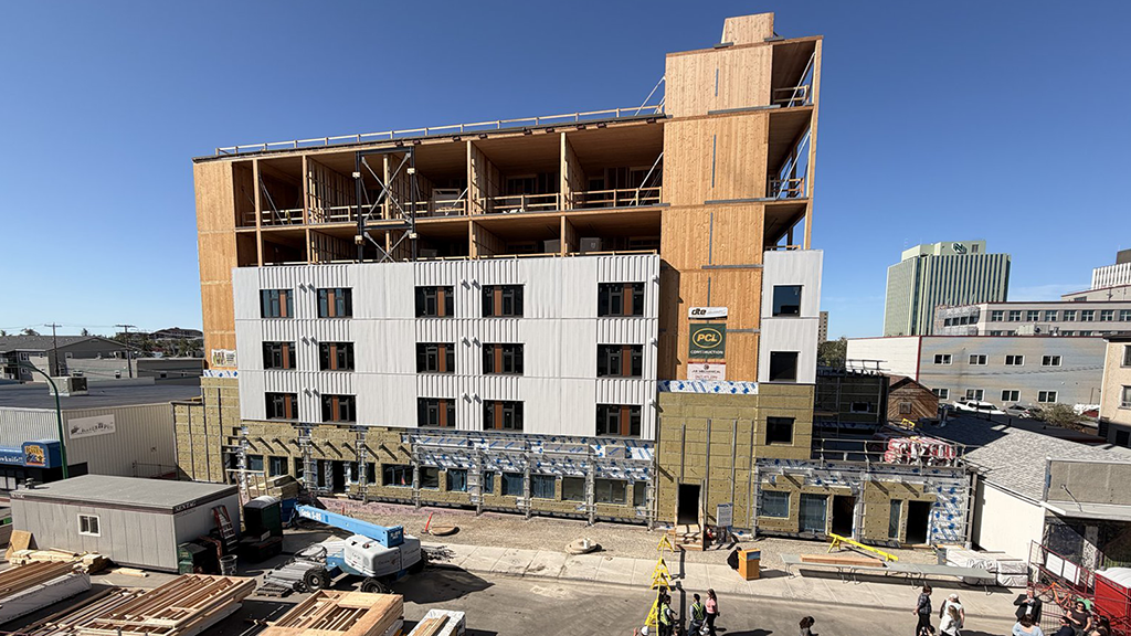 PCL Celebrates Topping Out of Mass Timber Housing Project in Yellowknife